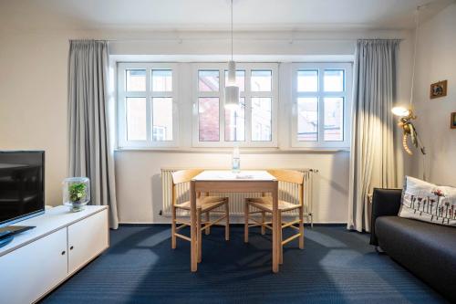 ユイストにあるInselresidenz Strandburg - Studio 110 (Ref: 50961)のリビングルーム(テーブル、椅子、ソファ付)