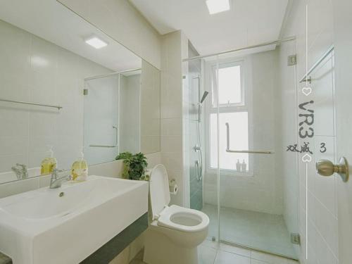 a bathroom with a sink and a toilet and a shower at VR31313-2BR 6Pax SUNWAY VELOCITY SHOPPING MALL KL in Kuala Lumpur