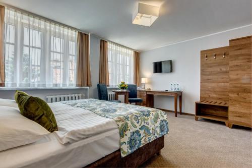 Posteľ alebo postele v izbe v ubytovaní Hotel Książ