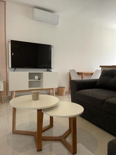 Et tv og/eller underholdning på Apartamento adosado