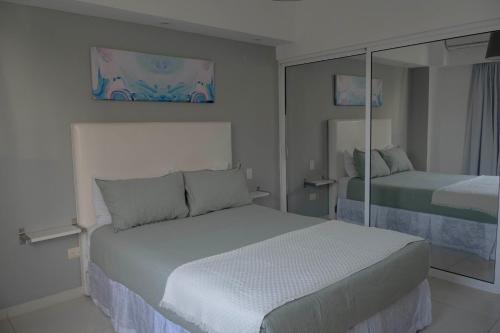 Кровать или кровати в номере Lincoln Suite
