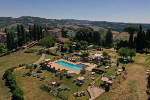 an aerial view of a large estate with a swimming pool at "Villa Bizzi" in Monte Castelli