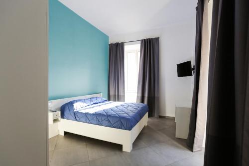 Ein Bett oder Betten in einem Zimmer der Unterkunft Duomo 34 Guest Room