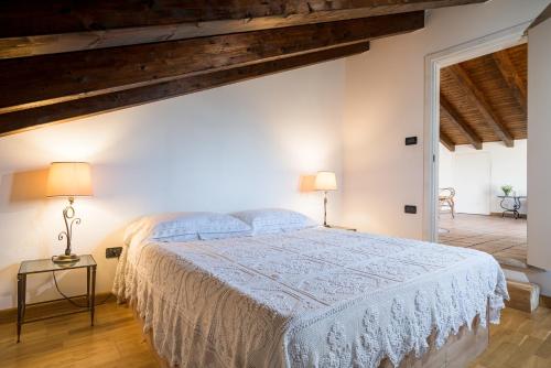 a bedroom with a large bed in a room at Villa Tina in Taormina