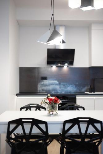 Η κουζίνα ή μικρή κουζίνα στο Apartmani Mozart-centar Virovitica