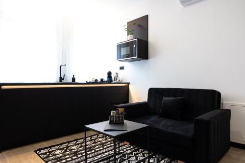 Χώρος καθιστικού στο Apartmani Mozart-centar Virovitica