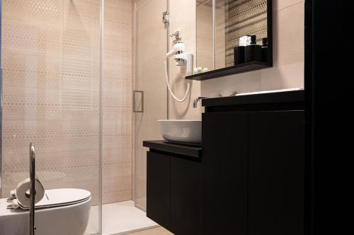 Ένα μπάνιο στο Apartmani Mozart-centar Virovitica
