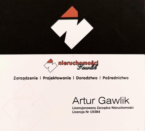 a white envelope with an arrow sign on it at Apartamenty Jagodzianka - Jacuzzi, Sauna, Tężnia solankowa in Ustrzyki Dolne