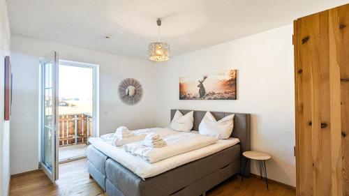 Postel nebo postele na pokoji v ubytování Ferienwohnung Landliebe