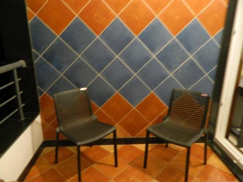 Ein Sitzbereich in der Unterkunft Torch Ginger Homestay