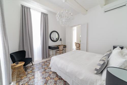 Ένα ή περισσότερα κρεβάτια σε δωμάτιο στο Carmelita Valletta