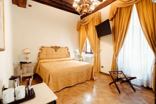 Cama o camas de una habitación en Hotel Palazzo Alexander