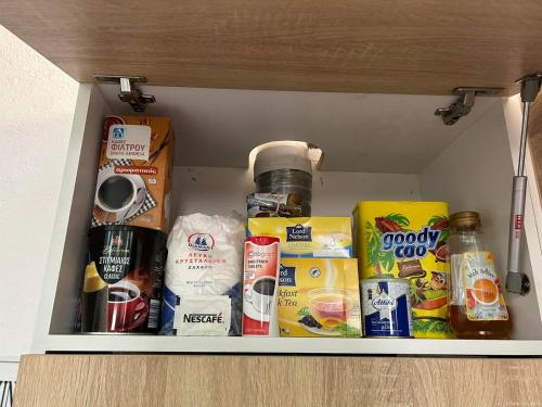 a drawer filled with food and other food items at Ano Poli Studios 4 in Thessaloniki
