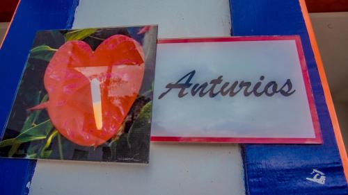 a picture of a heart with the word antigua at Hotel Terra Belén in Belén de Umbría