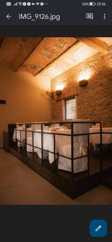 Katil atau katil-katil dalam bilik di Locanda del vecchio mulino