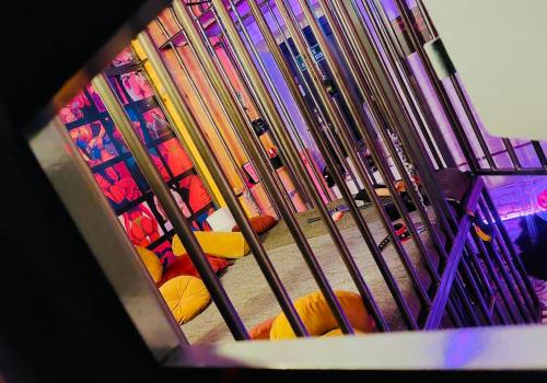 an overhead view of a metal bars in a room at Secret Room votre chambre coquine et insolite en espace privatif a Tournai in Tournai