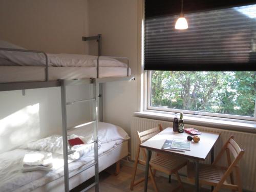 Postel nebo postele na pokoji v ubytování Danhostel Rebild