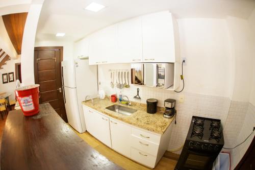 Η κουζίνα ή μικρή κουζίνα στο Magnífica casa, peró,Cabo Frio