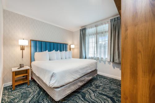 a hotel room with a bed and a window at Hallmark Resort in Cannon Beach in Cannon Beach