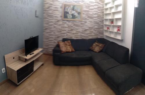 Μια τηλεόραση ή/και κέντρο ψυχαγωγίας στο Casa Pé na Areia Monte Alto Arraial do Cabo RJ