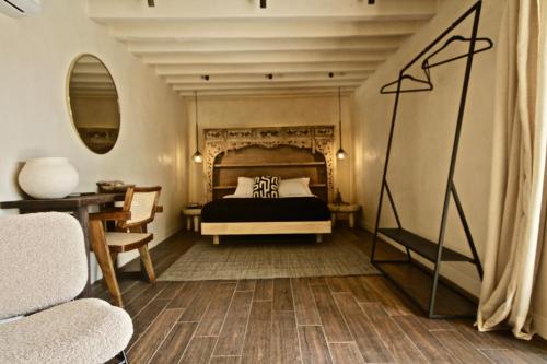 Postel nebo postele na pokoji v ubytování Casa Realm