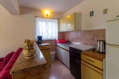 Kuchyňa alebo kuchynka v ubytovaní Apartment in Jadranovo 14267