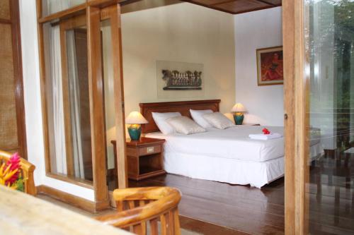 Giường trong phòng chung tại Yeh Panes Hot Spring Resort