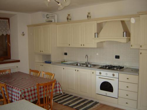 Kuchyň nebo kuchyňský kout v ubytování Residenza Domino
