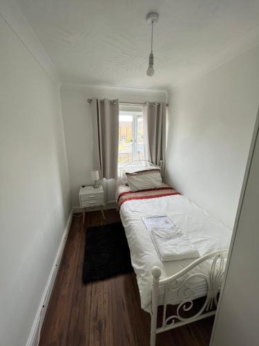 En eller flere senge i et værelse på Fellowes View