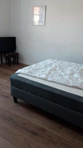 Uma cama ou camas num quarto em Apart Burg