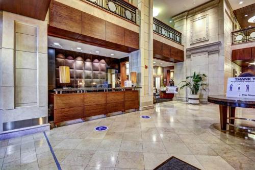 a large lobby with aasteryasteryasteryasteryasteryasteryasteryasteryasteryasteryastery at Chase Penthouse at 39 west Baltimore Inner Harbor Convention center free indoor parking one and two bedrooms in Baltimore