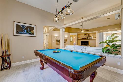 a living room with a pool table in it at R-Time in Sebastian