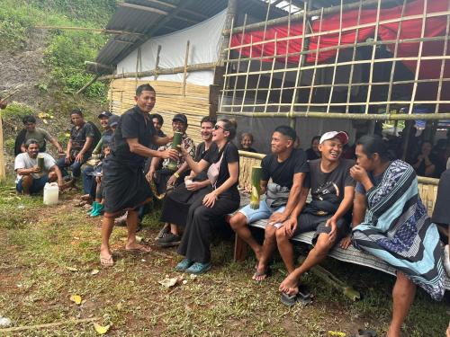 a group of people posing for a picture at THE SINGKI HOME FAMILY in Rantepao