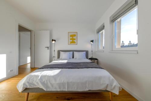 Ένα ή περισσότερα κρεβάτια σε δωμάτιο στο Charming 2 Bedroom Apartment