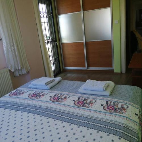 Ένα ή περισσότερα κρεβάτια σε δωμάτιο στο Villa Latanya