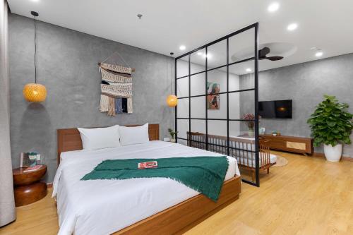 Letto o letti in una camera di Lagom Boutique Hotel Da Nang