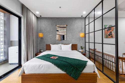Letto o letti in una camera di Lagom Boutique Hotel Da Nang