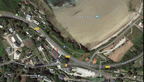 a map of a road and a beach at Au Petit Brick - Cosy beachfront house in Maupertus-sur-Mer