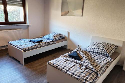 Katil atau katil-katil dalam bilik di Work & Stay Apartments in Hönningen