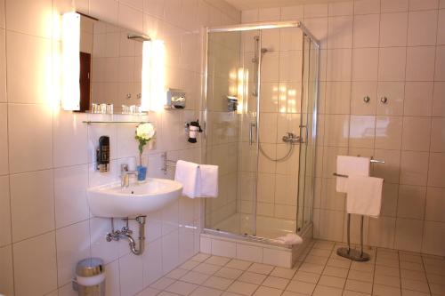 Koupelna v ubytování Hotel Altenwerder Hof