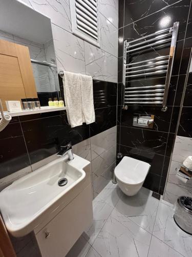 Koupelna v ubytování Lily Rooms