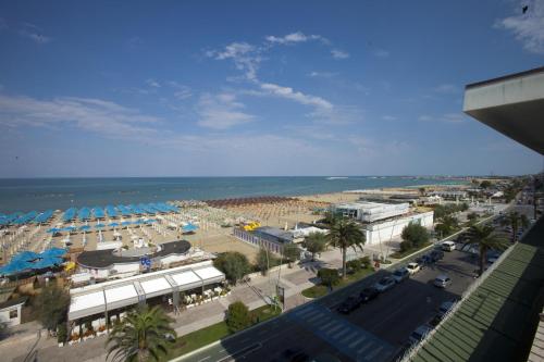 a beach with a lot of boats on it at Hotel Carlton in Pescara