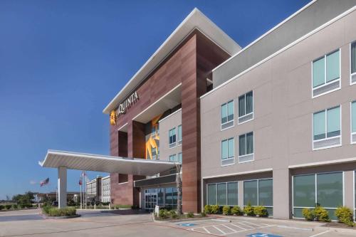 a rendering of the front of a hotel at La Quinta Inn & Suites by Wyndham Texas City I 45 in Texas City