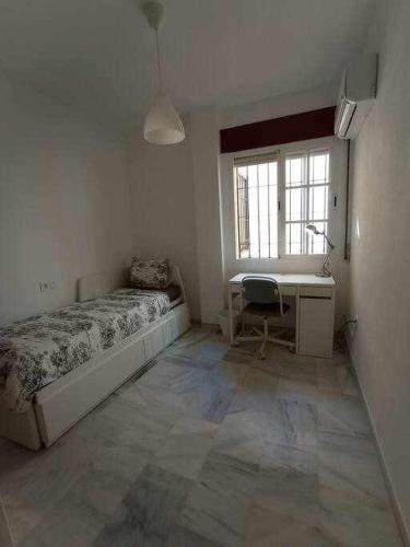Posteľ alebo postele v izbe v ubytovaní 4 rooms pkg Marmoles Malaga