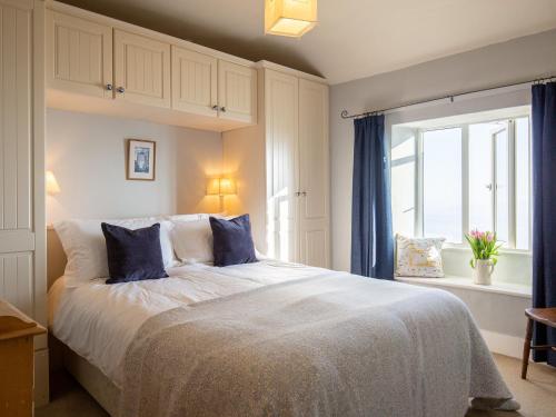Llit o llits en una habitació de Swift Cottage