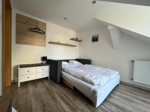 Posteľ alebo postele v izbe v ubytovaní Rabbit apartman
