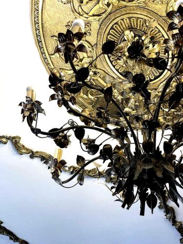 a gold chandelier with flowers on it at DAY & NIGHT in Odesa