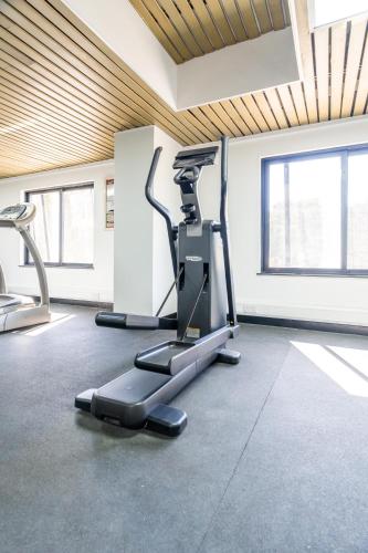 a gym with two treadmills and a treadmill at Sarova Imperial Hotel in Kisumu