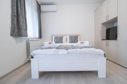 Pegasus apartmentsにあるベッド