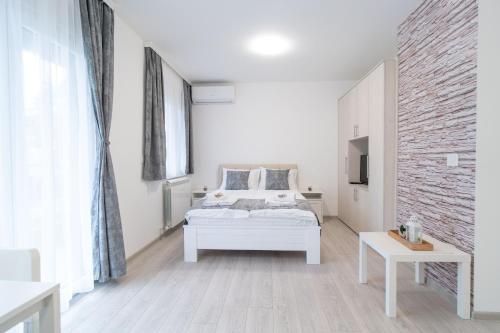 Pegasus apartmentsにあるベッド